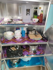 Una cocina o cocineta en Pangkor Villa Jia Yuan 邦咯岛家苑海滩别墅