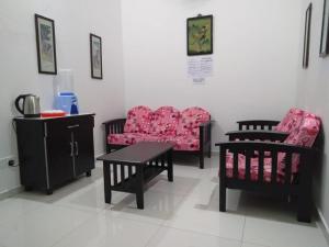 Un lugar para sentarse en Pangkor Villa Jia Yuan 邦咯岛家苑海滩别墅