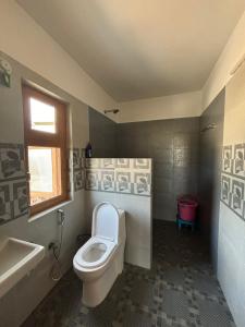 Koupelna v ubytování The Naggar Trails + 11 fotografií