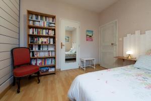 Ένα ή περισσότερα κρεβάτια σε δωμάτιο στο Manoir De Gourvinec - Chambre