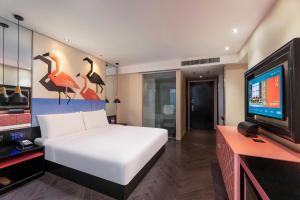 TV/trung tâm giải trí tại Orange Hotel Suzhou Xiangcheng Avenue Global Harbor