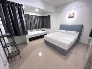 Postel nebo postele na pokoji v ubytování Family House Sunway 4BR Walk to Lagoon Pyramid University