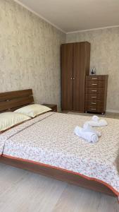 Postel nebo postele na pokoji v ubytování 3-х комнатная квартира в золотом квадрате столицы