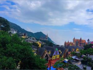 a view of a town with buildings and trees at Star Hotel - Khách sạn Ngôi Sao in Tam Ðảo