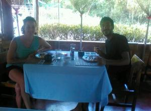 a man and a woman sitting at a table at Star Lotus Guesthouse in Sampong