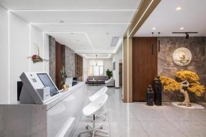 Vstupní hala nebo recepce v ubytování Yangshuo Yi ju hotel