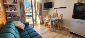 Et opholdsområde på Studio avec jardin et garage