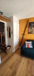 Et opholdsområde på Studio avec jardin et garage