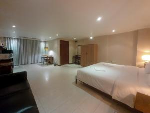 Postel nebo postele na pokoji v ubytování Townhouse PK Garden