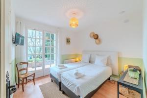 Ένα ή περισσότερα κρεβάτια σε δωμάτιο στο Bruyère et Charmes de Bourgogne