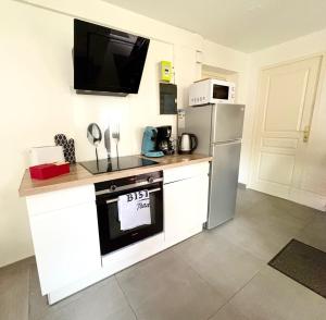 Kuchyň nebo kuchyňský kout v ubytování Spacious quiet apartment near Strasbourg