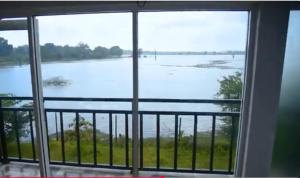 a view of a river from a window at Kataragama leopard One Villa Yala in Gotamegama