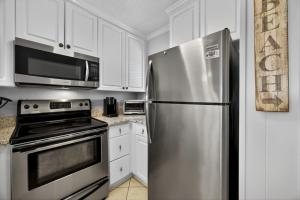 Kuchyň nebo kuchyňský kout v ubytování Coco Cabana - Monthly Rates Available! condo + 19 fotografií