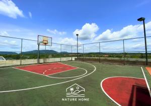 a basketball court with a basketball hoop at Nature Home - Swiss Garden Resort Residences - Weekend Free Breakfast in Kuantan