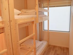 Un pat suprapus sau paturi suprapuse la RetroSpect Stay Yokohama - Vacation STAY 93126v