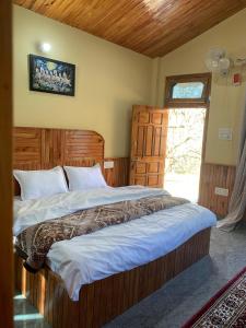 Postel nebo postele na pokoji v ubytování Wonderway Retreat Jari + 38 fotografií