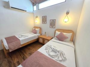 Кровать или кровати в номере Brizo Paradiso