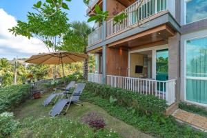 Κήπος έξω από το Beachfront Luxury 1R Condo near Marriot Naiyang 50 2