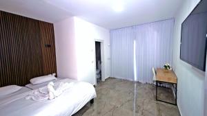 Postel nebo postele na pokoji v ubytování אחוזת חושן