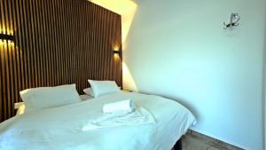 Postel nebo postele na pokoji v ubytování אחוזת חושן