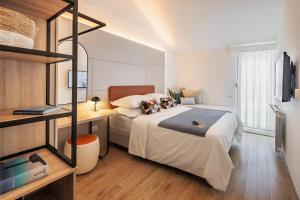 Una cama o camas en una habitación de Hotel Waterman Kaktus 20 fotos más