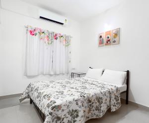 Postel nebo postele na pokoji v ubytování The Pinnacle - Electronic City