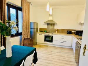 Η κουζίνα ή μικρή κουζίνα στο Chez Côme - Le confort aux portes de Strasbourg +32 φωτογραφίες