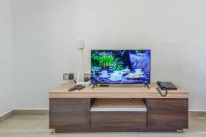 Μια τηλεόραση ή/και κέντρο ψυχαγωγίας στο Yvon's Tropical Villa