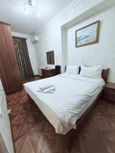 Кровать или кровати в номере Republic Square family luxury 2 bedroom 2 bathroom