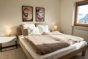 Postel nebo postele na pokoji v ubytování Sunside Stay