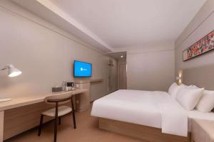 Μια τηλεόραση ή/και κέντρο ψυχαγωγίας στο Hanting Hotel Nanjing Jiangning Niu Shoushan