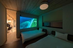 Llit o llits en una habitació de akesuke