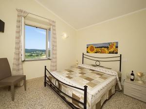 A bed or beds in a room at Casa di Campagna