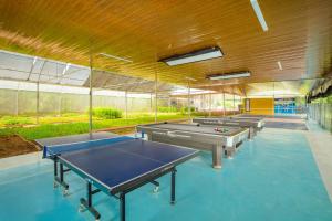 Stolní tenis v ubytování Hoa An Viên Villa nebo okolí