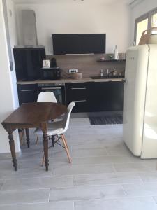 Una cocina o cocineta en Marco Polo 3 pers pool