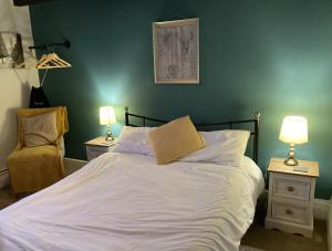 Postel nebo postele na pokoji v ubytování Red Lion