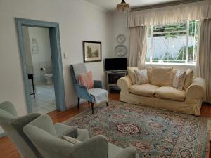 Гостиная зона в Die Tuishuise & Victoria Manor