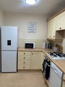 Køkken eller tekøkken på The Cosy Geordie + 7 billeder