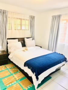 Postel nebo postele na pokoji v ubytování Melville koppies view guest house