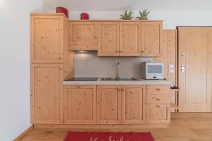 Kuchyň nebo kuchyňský kout v ubytování Dolomites Essence