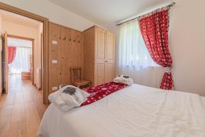 Postel nebo postele na pokoji v ubytování Dolomites Essence + 39 fotografií