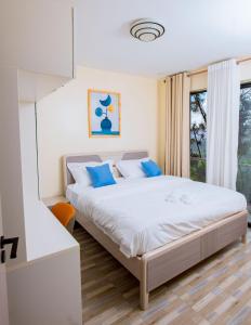 Ένα ή περισσότερα κρεβάτια σε δωμάτιο στο Glads ndera SO2