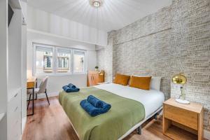 Postel nebo postele na pokoji v ubytování Picasso 2