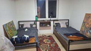 Ένα ή περισσότερα κρεβάτια σε δωμάτιο στο Play Apartments