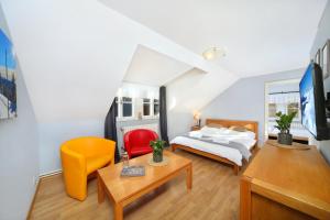 Postel nebo postele na pokoji v ubytování Hotel Erika