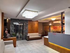 O zonă de relaxare la Hotel The Divine Inn