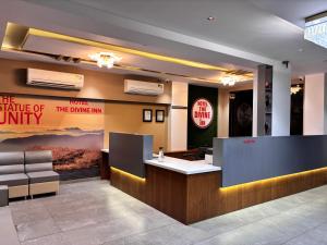 O zonă de relaxare la Hotel The Divine Inn +7 fotografii