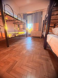 Ένα ή περισσότερα κρεβάτια σε δωμάτιο στο OLO Hostel & Bar Club VIEDMA
