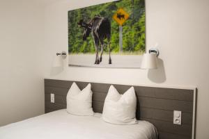 Ένα ή περισσότερα κρεβάτια σε δωμάτιο στο Villa Canada - Domaine Le Sherwood +5 φωτογραφίες