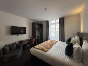 Postel nebo postele na pokoji v ubytování Best Western Blois Château